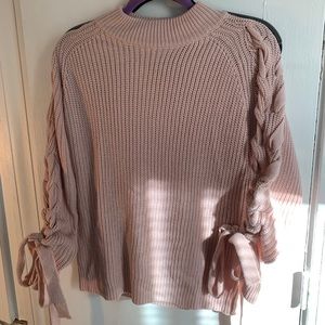 Lilac sweater with tying sleeves